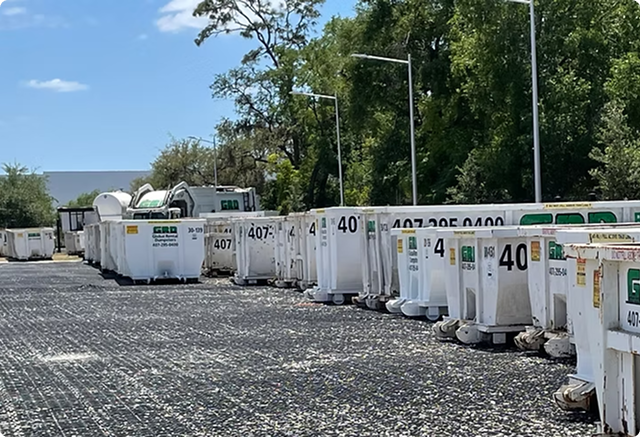 Global Rental Dumpsters yard — fleet of well-maintained dumpsters